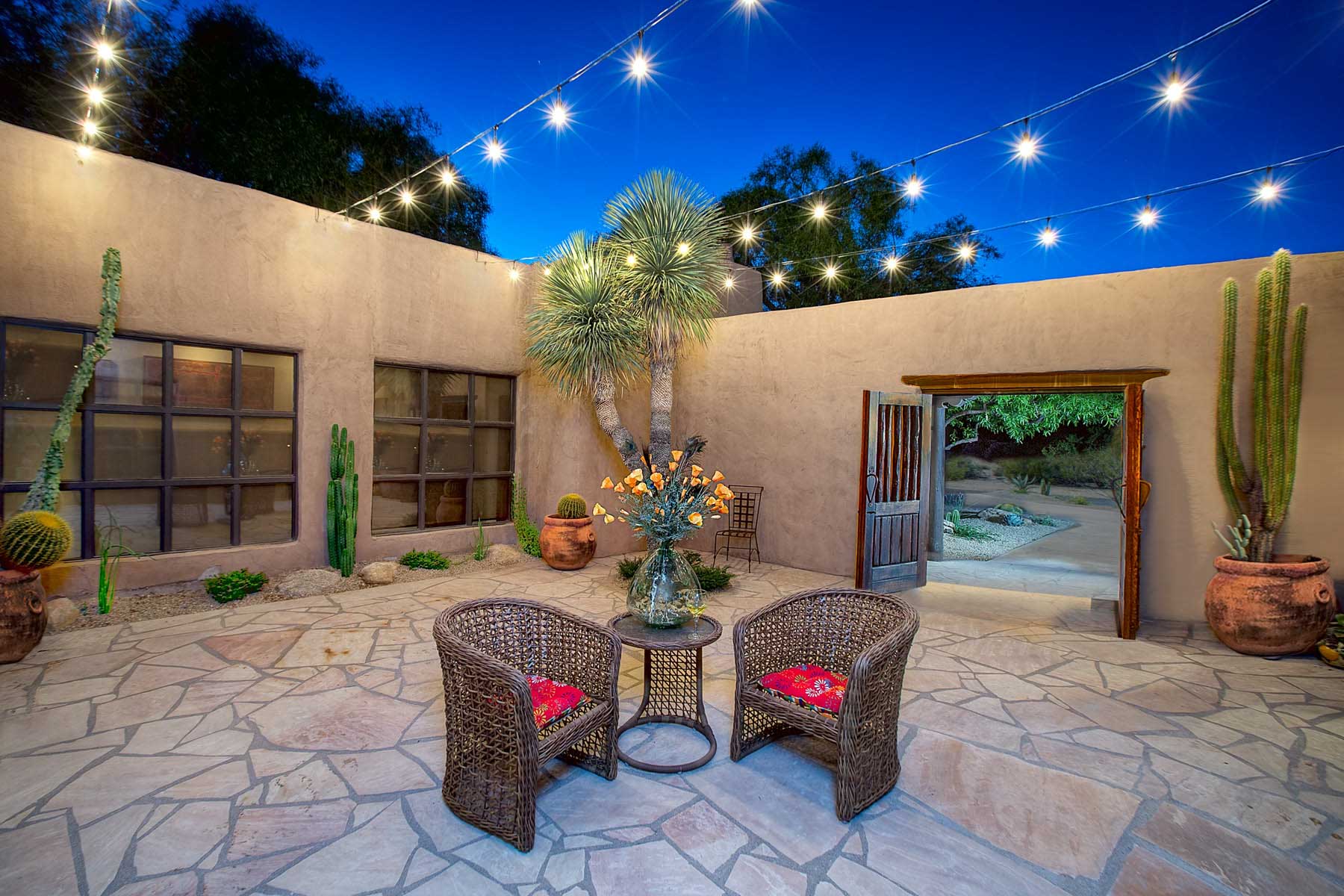 20150717090525_luxury home exteriors 32 twilight courtyard indian rock